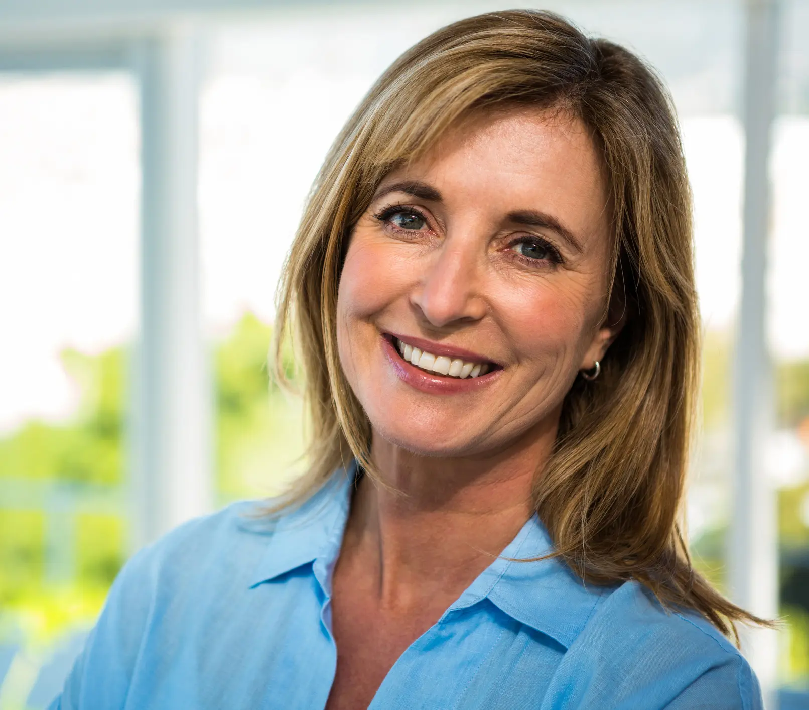 happy woman smiling Mini Facelift in Indianapolis, Indiana