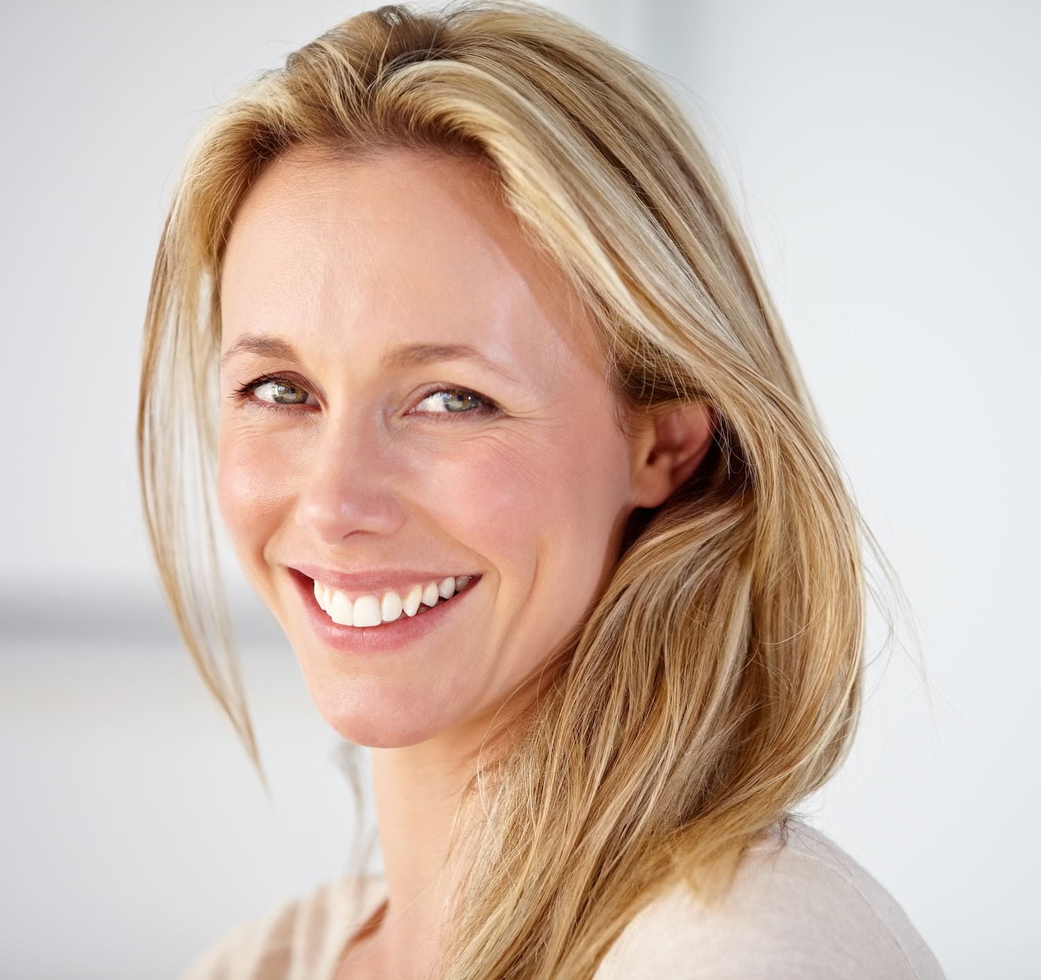 Her smile could brighten any room! CoolSculpting® in Indianapolis, Indiana